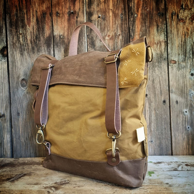 Noce zaino borsa trasformabile cerato oliva